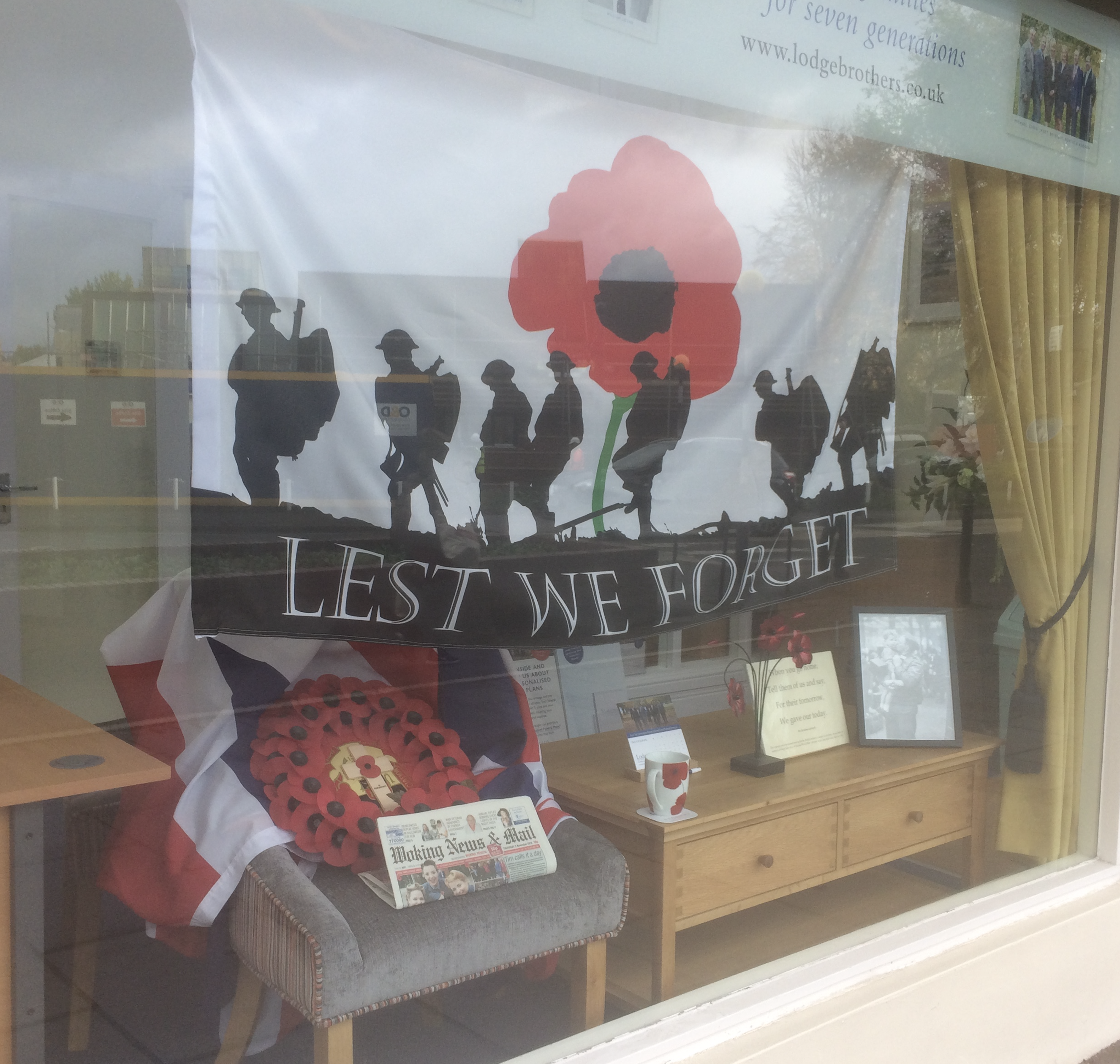Lodge Brothers Woking Remembrance Window Display Makes the Papers! Lodge Brothers Woking Remembrance Window Display Makes the Papers!